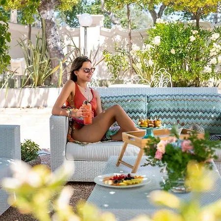 Отель Residenza Parco Fellini 4*